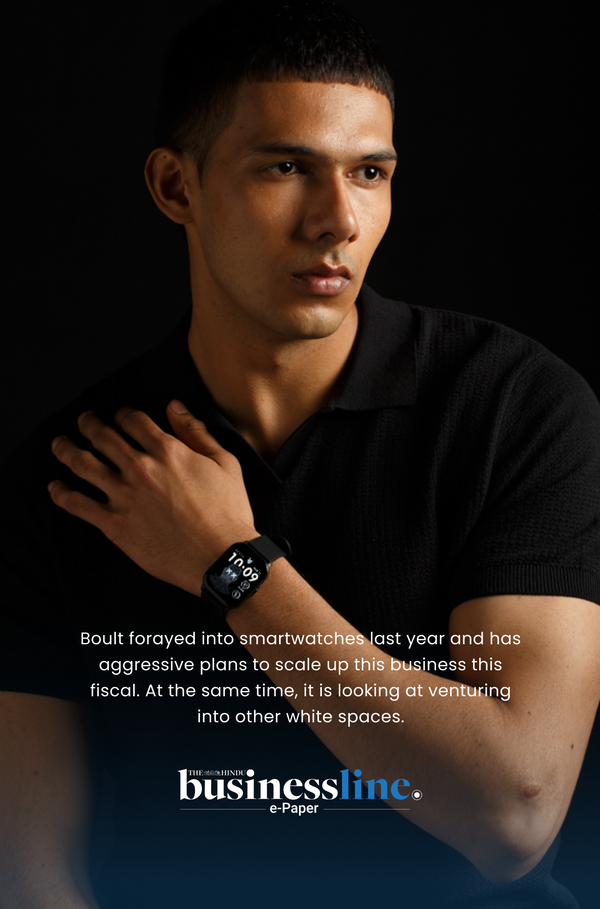 Model wearing smartwatch, with praising quote from Business Line, Mobile